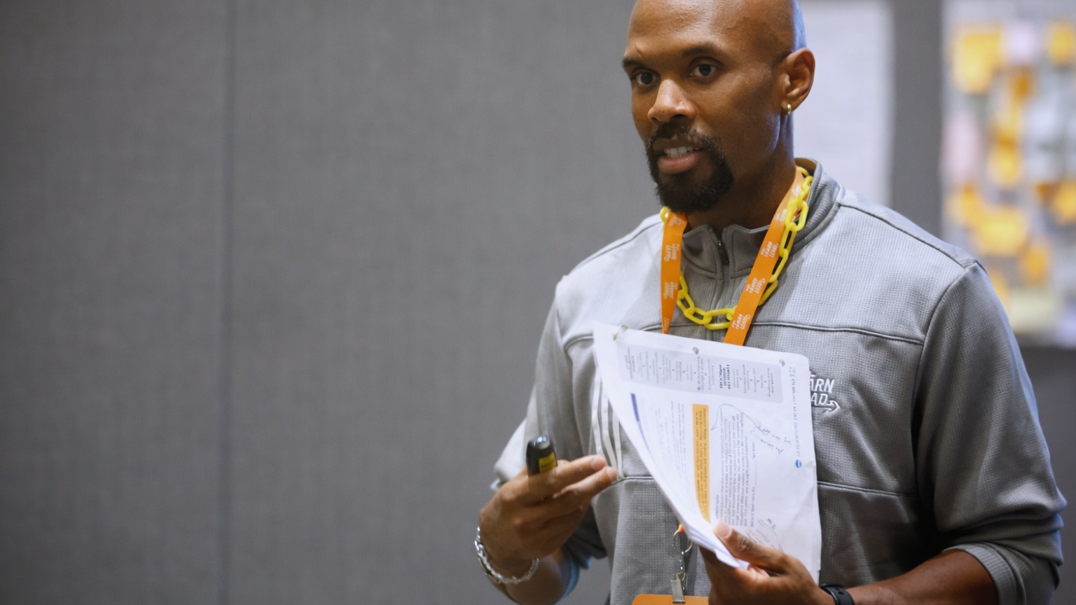 Coach addressing athletes